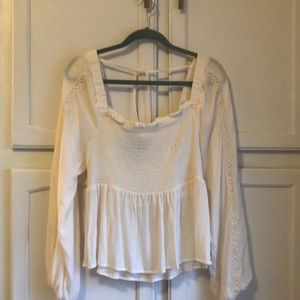 Ivory smocked blouse with lace arm detail